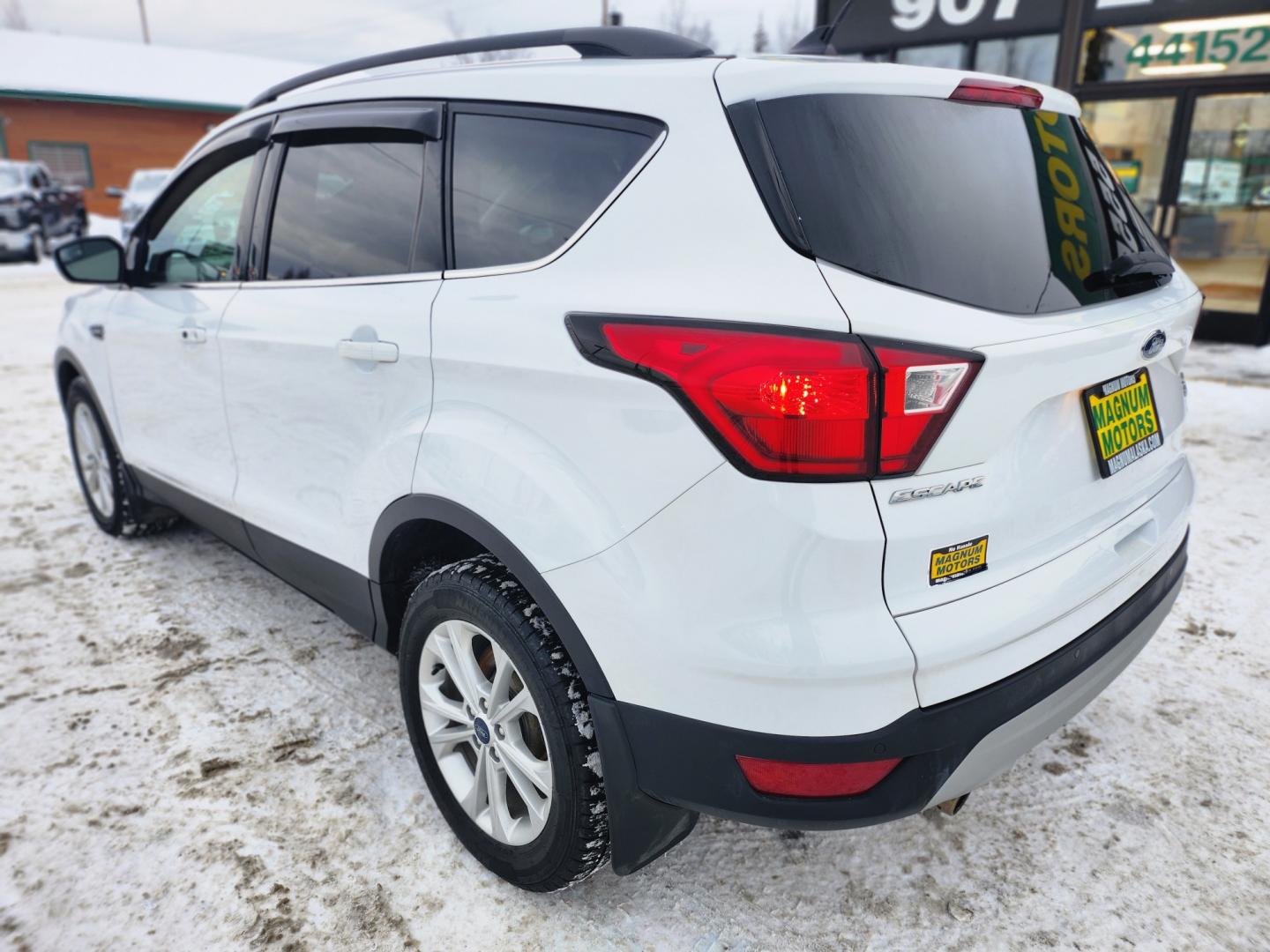 2019 White /BLACK Ford Escape SEL 4WD (1FMCU9HDXKU) with an 1.5L L4 DOHC 16V engine, 6A transmission, located at 1960 Industrial Drive, Wasilla, 99654, (907) 274-2277, 61.573475, -149.400146 - Photo#4